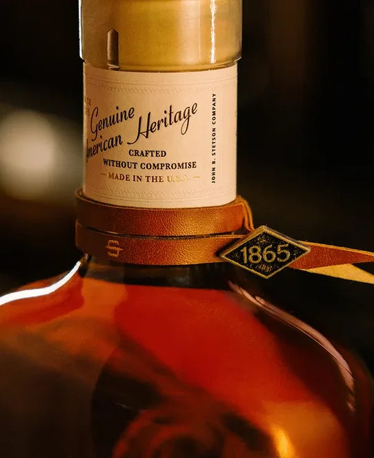 Close detail of the Stetson Bourbon bottle neck and 1865 tag
